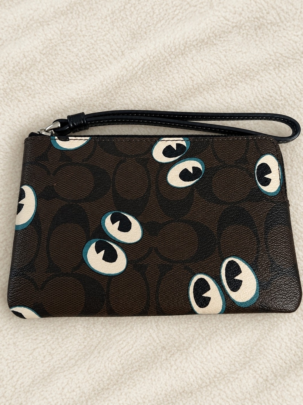 Coach Brown Signature Wristlet with Eye Graphic